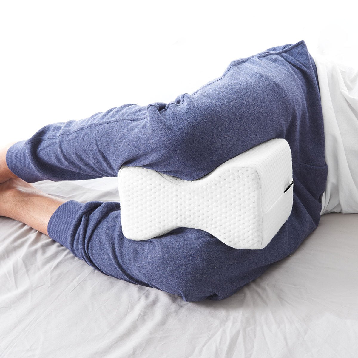 207120-z1_1082bab1-24a2-4386-886a-f5a384f67616.jpg Cooling Foam Leg Pillow by Sharper Image - Image 1